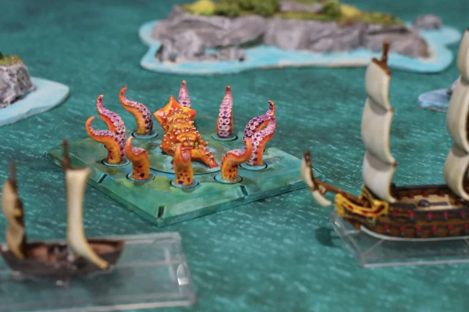 Kraken attacking a fleet of Spanish ships near some islands